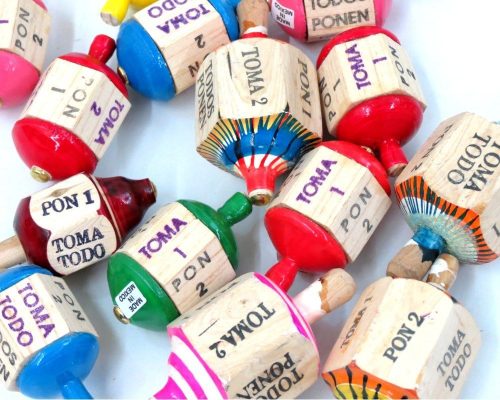 Children learn simple Spanish phrases with this traditional game.